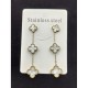 The new high -end earrings, the two -sided female four -faced female four -leaf earrings titanium steel does not fall off the color ear hanging combination simple temperament