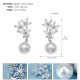 Cross -border jewelry fashion versatile vermiculite high -level sensing party earrings bride bride wedding pearl ear ring girl