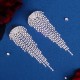 European and American foreign trade new rhinestone claws chain ear pendant party party bride earrings light luxury niche exaggerated flowing earrings