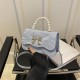 2024 new temperament fashion pearl handblack -bodied foreign pure color design fresh butterfly texture messenger bag