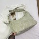 Large -capacity bag female 2024 new pure color texture niche summer versatile shoulder mesengers bag women's dumpling bag