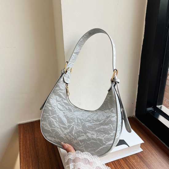 New temperament Simple ladies shoulder bag summer fashion versatile diagonal bag niche design crescent bag