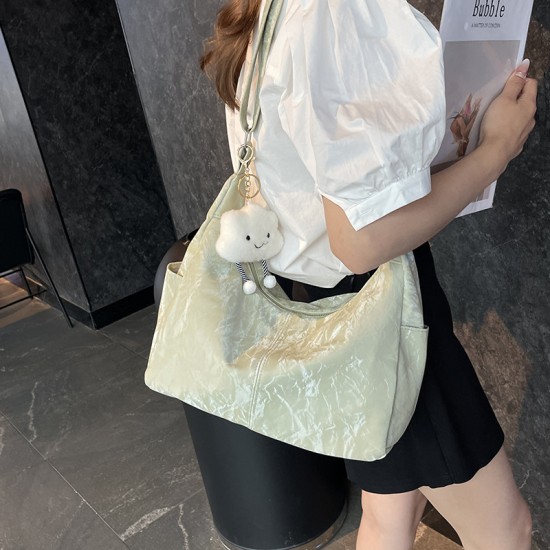 Large -capacity bag female 2024 new pure color texture niche summer versatile shoulder mesengers bag women's dumpling bag