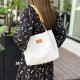 Large -capacity ladies bag 2024 new summer texture niche niche class, general commute bag versatile shoulder bag