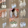 Assorted shell drop earrings with a 925 sterling silver pin