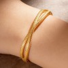 Stainless Steel Gold-Colored Bangle with Open Hollow Design