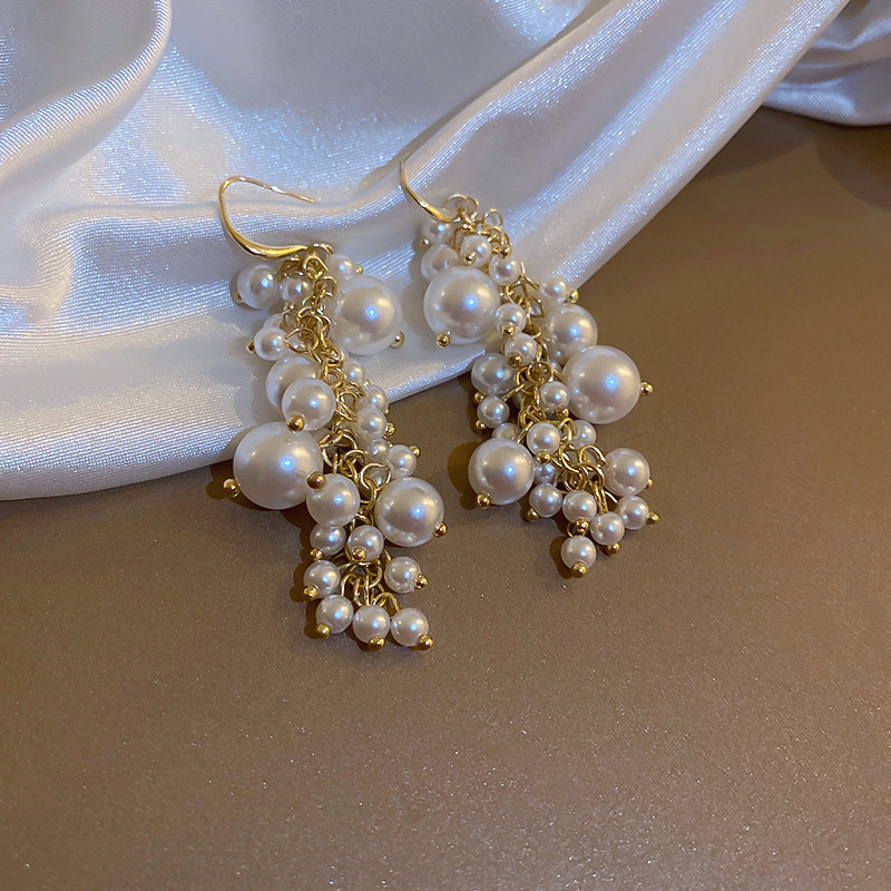 Silver needle flower love tassel earrings simple fashion Joker earrings small fresh light luxury high sense earrings wholesale
