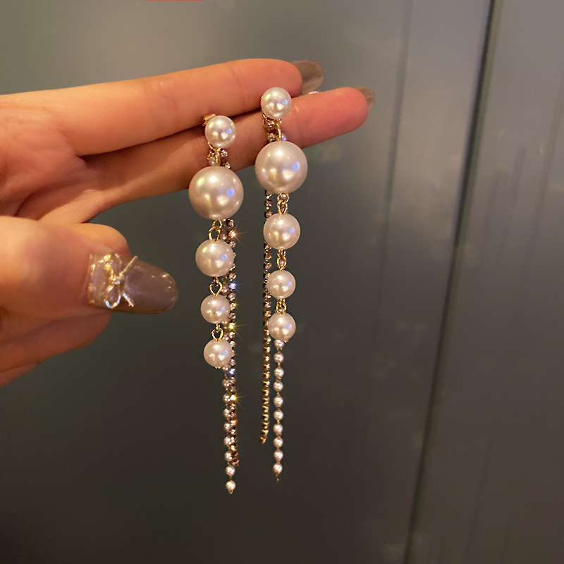 Silver needle flower love tassel earrings simple fashion Joker earrings small fresh light luxury high sense earrings wholesale