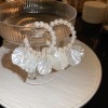 Silver needle flower love tassel earrings simple fashion Joker earrings small fresh light luxury high sense earrings wholesale
