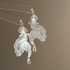 Silver needle flower love tassel earrings simple fashion Joker earrings small fresh light luxury high sense earrings wholesale