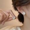Silver needle flower love tassel earrings simple fashion Joker earrings small fresh light luxury high sense earrings wholesale