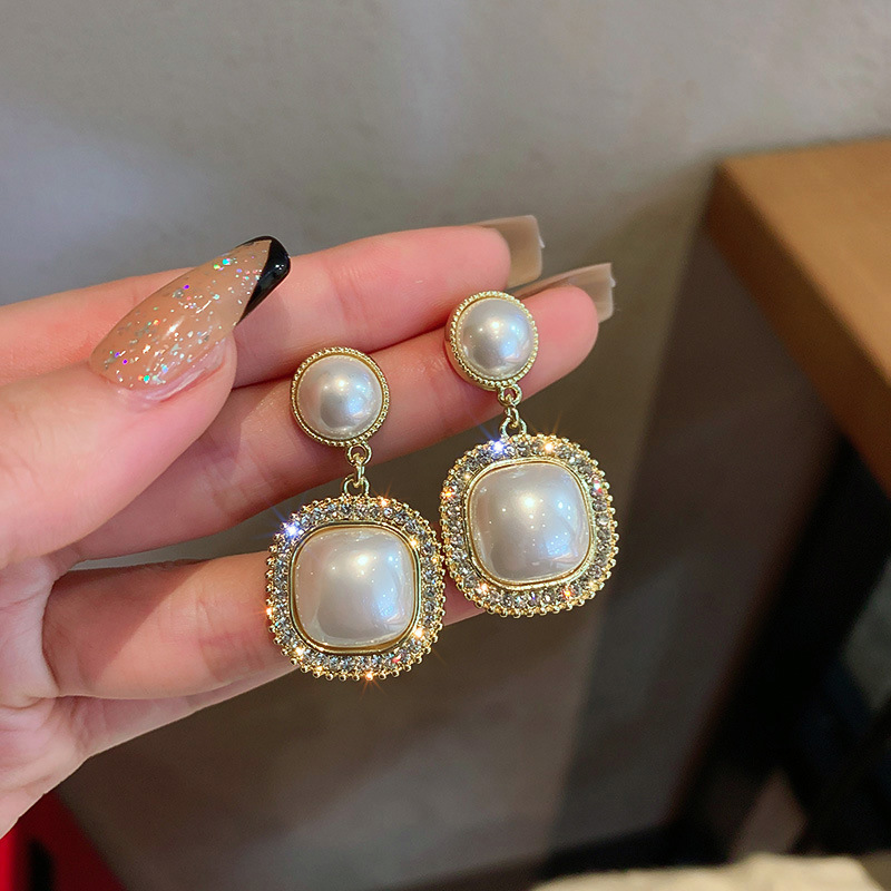 Silver needle flower love tassel earrings simple fashion Joker earrings small fresh light luxury high sense earrings wholesale